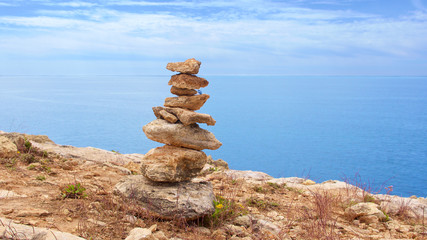 Fototapeta na wymiar Zen stones on beach for perfect meditation