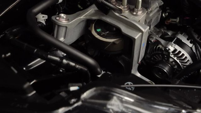 Closeup detailed view of new car engine compartment, Dolly shot
