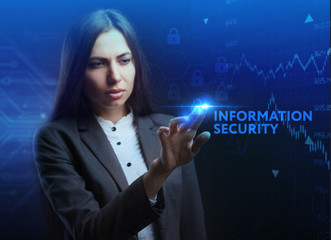 The concept of business, technology, the Internet and the network. A young entrepreneur working on a virtual screen of the future and sees the inscription: Information security