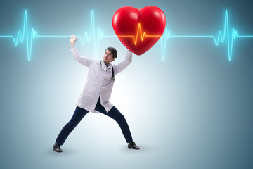 Doctor cardiologist supporting cardiogram heart line