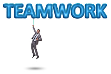 Businessman flying in teamwork concept