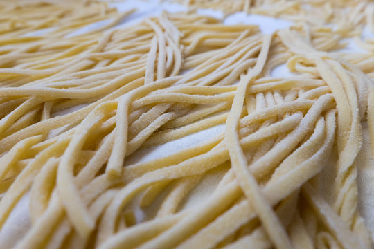 homemade spaghetti, also known as "torchi" or "troccoli"