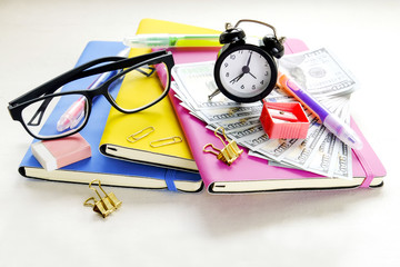 Investing time & money in expensive education, college tuition & fees concept. Pack of new one...