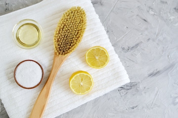 Natural Ingredients for Homemade Body Sea Salt Scrub Lemon Olive Oil White Towel Beauty Concept Skincare Organic Wooden Body Massage Brush Aroma Spa Therapy