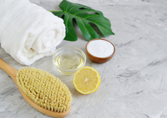 Natural Ingredients for Homemade Body Sea Salt Scrub Lemon Olive Oil White Towel Beauty Concept Skincare Organic Wooden Body Massage Brush Aroma Spa Therapy