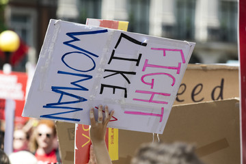 Fight like women political banner at a protest march