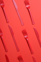 Red Forks and Knives on Bright Orange Background, Single Use Cutlery