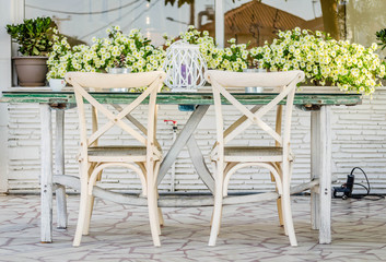 Chairs in the garden restaurant in Leptokaria, Greece 