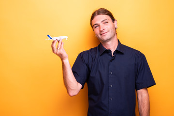Man presenting toy airplane