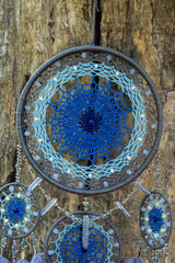 Handmade dream catcher with feathers threads and beads rope hanging