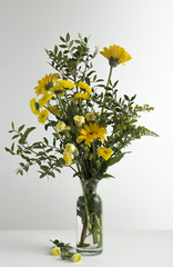 Yellow flowers in a vase