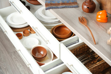 Drawers with different kitchenware