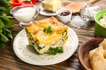 Lasagna with spinach on table