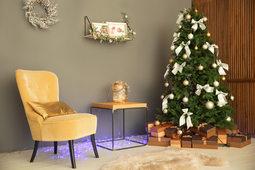 Room interior with beautiful Christmas tree and gifts
