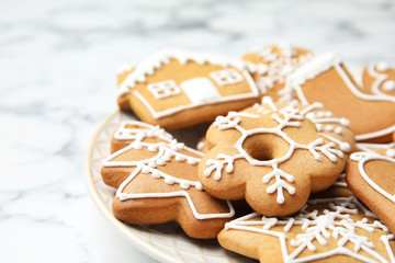 Plate with tasty homemade Christmas cookies, closeup
