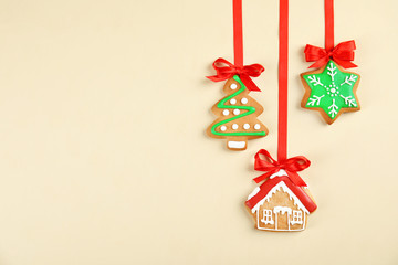 Tasty homemade Christmas cookies on color background, top view