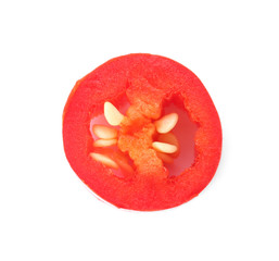 Slice of ripe chili pepper on white background, top view