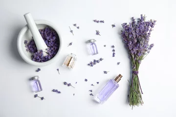 Foto op Canvas Composition with lavender flowers and natural cosmetic on white background, top view © New Africa
