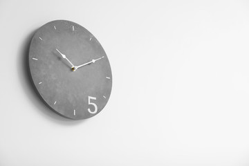 Stylish clock on white background. Time concept