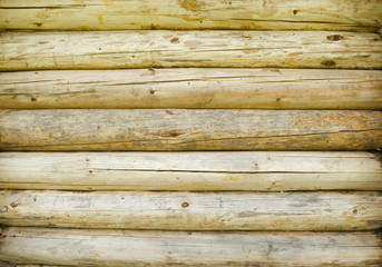 Obraz premium Blocks of wood stacked as wall. Wooden background with light colors. Pattern, texture.