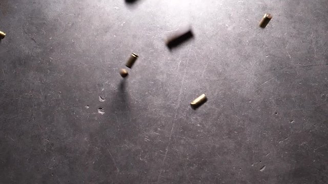 Bullet cases falling in slow motion