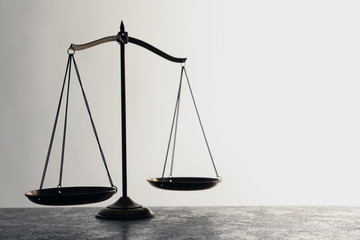 Scales of justice on table. Law concept