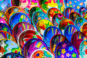 Plates in the traditional Mexican style. Souvenirs from Chichen Itza, Yucatán, Mexico.