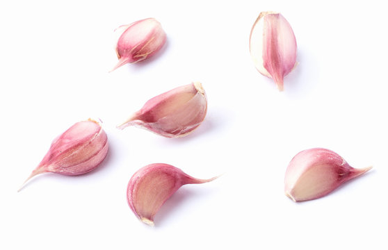 Six cloves on white