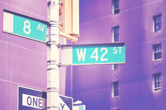 Manhattan West 42 Street and 8th Avenue street name signs, color stylized picture, New York City, USA. © MaciejBledowski