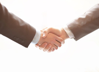 Closeup of business hand shake between two colleagues