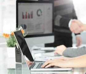 close - up of young business woman at workplace