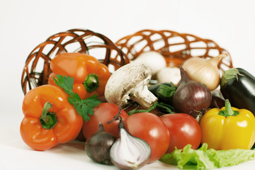 closeup.mushrooms and fresh vegetables in a wicker basket