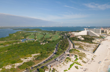 Cancun beach panorama aerial view. Aerial view of Caribbean Sea beach. Zona hotelera top view.  Beauty nature landscape with tropical beach. Caribbean seaside beach with turquoise water and big wave