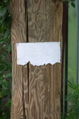 Photo of paper banner on wooden column