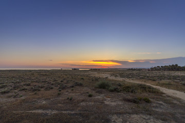 Sunset seascape of Salgados beach in Albufeira, Algarve.