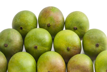 Raw Mangoes arranged on table top indoor