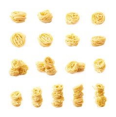 Uncooked fettuccine pasta isolated