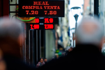 Panel of Brazilian real quotation  in Argentina with buying and selling prices seen between...