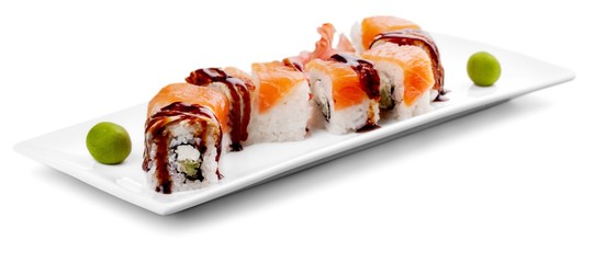 Maki-sushi on black plate