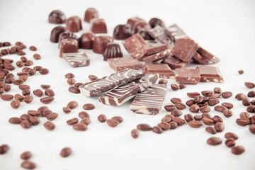 close up.set of chocolate bars and coffee beans. isolated on whi