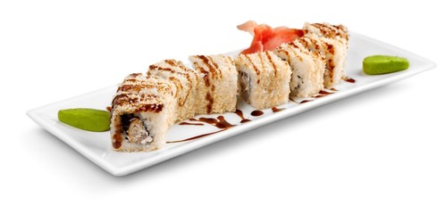 Maki-sushi on black plate