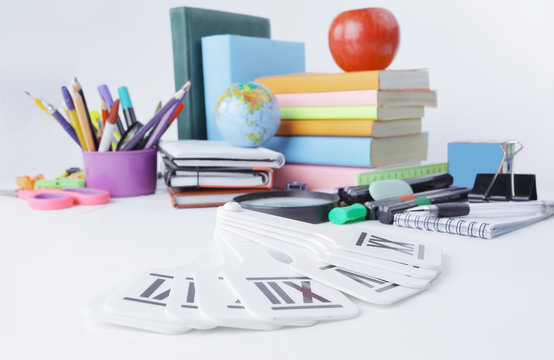 image of variety of school supplies on white background