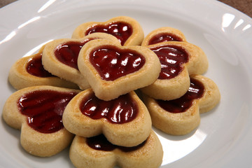 Heart shaped Valentines Day cookies with jam. Shaped biscuit cookie