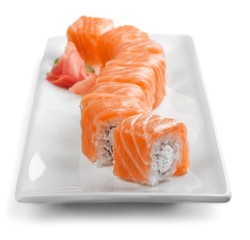 Maki-sushi on black plate