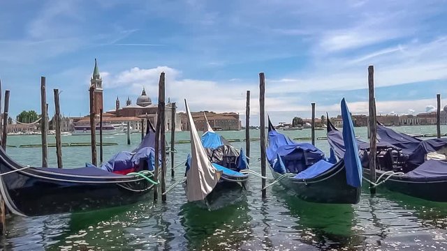 Many gondolas in Venice in Italy.