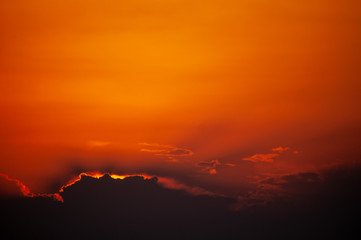 colorful dramatic sky with cloud at sunset.