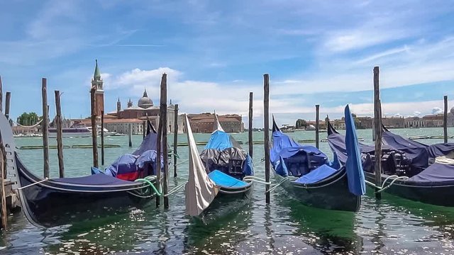Many gondolas in Venice in Italy.