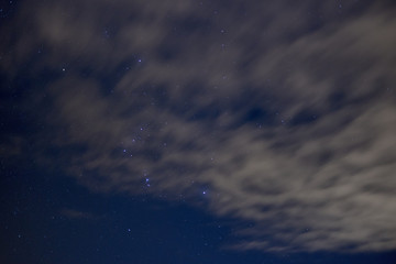 Stars behind clouds. 