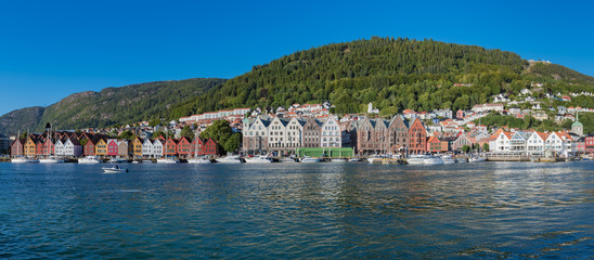 Fototapeta premium Panoramic shot of a Historical district Bryggen (Tyskebryggen) in the norwegian city Bergen. Hordaland, Norway, Europe.