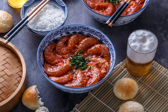 Close view of big prawn in spicy tomato sauce, asuan cuisine